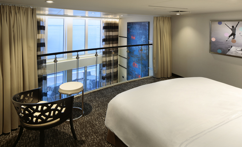 De loft suite slaapkamer op de Anthem of the Seas van royal Caribbean